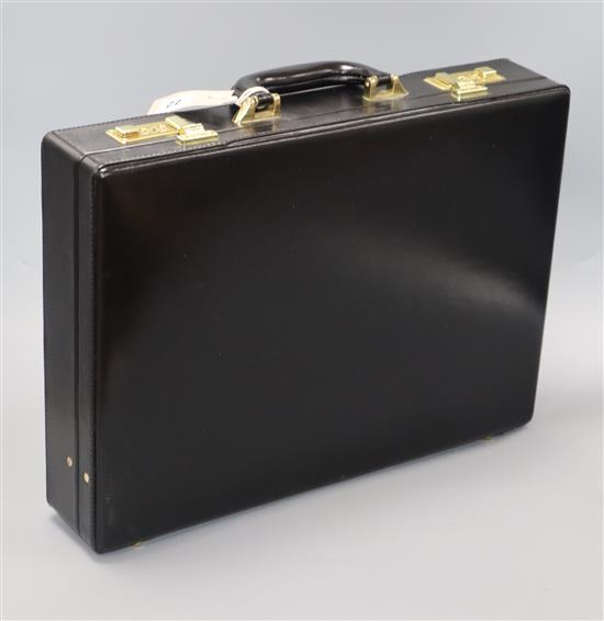 A German black leather case by Franzen